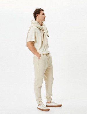 Спортивные брюки Jogger с кружевным принтом и карманом на талии