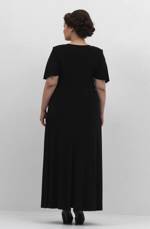 Черный Оригинальное платье максимальной длины с декоративным элементом - "ромб", расположенным под грудью. Легкая присборенность по центру образует красивую драпировку и маскирует нюансы фигуры. Фасон