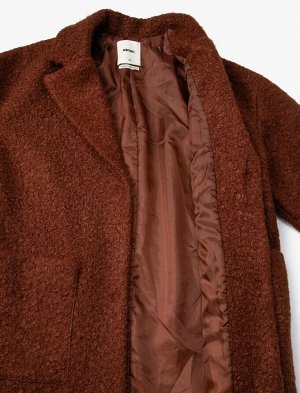 Длинное пальто оверсайз из букле, двубортный карман и детальная подкладка