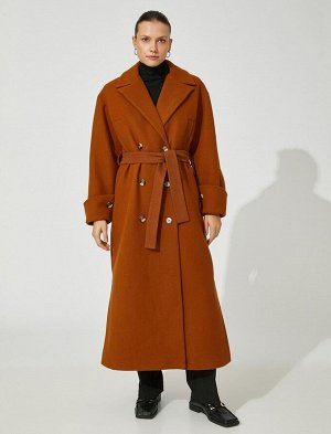 Двубортное длинное пальто с поясом и карманами