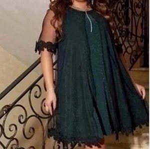 Платье свободного кроя с круглым воротом ткань Люрекс ,поверх рукава и по изделию сетка ,как на фото