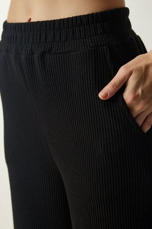 Женские черные трикотажные брюки в рубчик EW00005