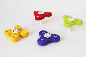 Игрушка-антистресс спиннер SPINNER на подставке Желтый