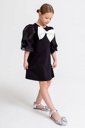 Платье Цвет: черный

Лаконичное платье из мягкого гладкого трикотажа с объёмными рукавами из полупрозрачного капрона.
Спереди декоративный съемный бант, который можно заменить на маленький бант в то
