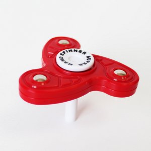 Игрушка-антистресс спиннер SPINNER на подставке Красный