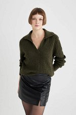 Женские свитеры и джемперы