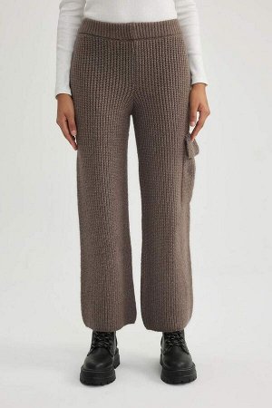 Широкие трикотажные брюки с карманами-карго
