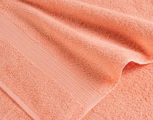 Персиковое махровое полотенце
