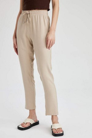 DEFACTO Тканые брюки с эластичной резинкой на талии и карманами
