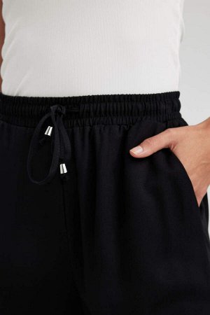 DEFACTO Тканые брюки с эластичной резинкой на талии и карманами