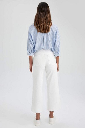 Узкие джинсовые брюки-кюлоты с расклешенной талией и высокой талией