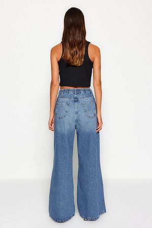 Синие очень широкие джинсы с высокой талией и эластичной резинкой на талии