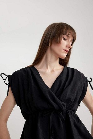 Блузка из модала с короткими рукавами стандартного кроя с запахом и воротником
