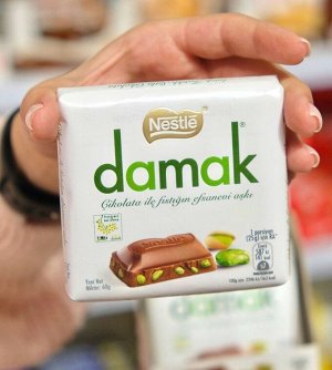 Молочный шоколад с фисташкой Nestle Damak 60 гр