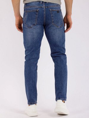 Джинсы Укороченные джинсы МОМ  с потертостями, изготовлены из мягкого, эластичного денима средней плотности. Модель с высокой посадкой, свободная в бедрах, штанины заужены книзу.
Цвет:&nbsp;
					
			
