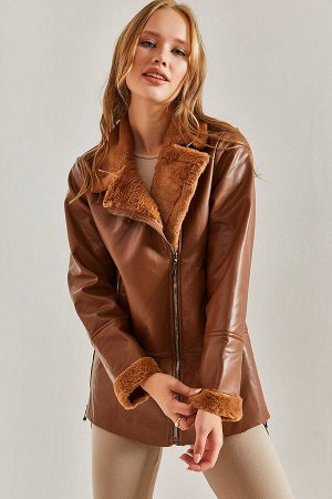 Женское кожаное пальто на меховой подкладке с небольшим карманом