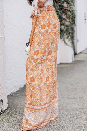 Оранжевые широкие брюки с флористическим принтом в стиле Бохо