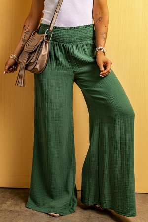Зеленые брюки свободного кроя из текстурированной ткани
