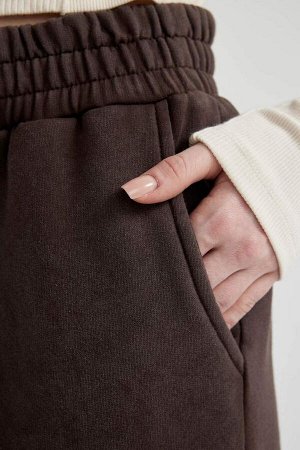 Моющиеся спортивные штаны с широкими штанинами и эффектом потертостей