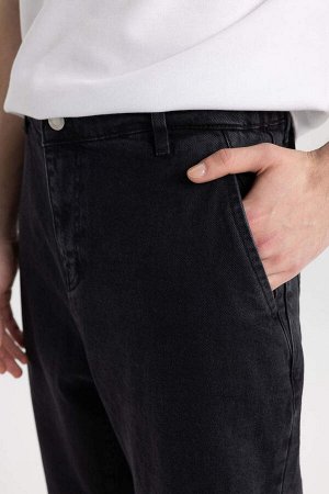 Свободные джинсовые брюки с напуском