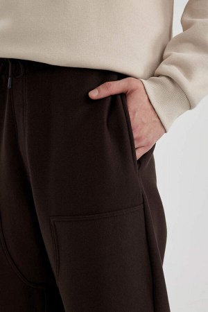 Прямые спортивные штаны оверсайз с карманами
