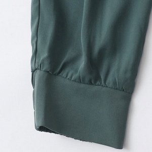 Женские легкие брюки темно-зеленого цвета, на резинке