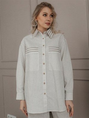 Рубашка Блузка-рубашка женская из льна и хлопка свободного силуэта, с центральной застежкой – планкой, застегивается на пуговицы. На полочке имеются большие накладные карманы. Рукав одношовный, выполн