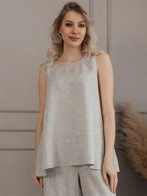 Майка Майка выполнена из льна с добавлением вискозы, без рукавов, с округлым вырезом горловины. Белая майка универсальный элемент женского гардероба, выйгрышно будет смотреться всегда, с пиджаком, жак