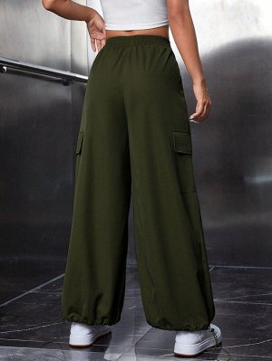Женские широкие штаны на затяжках, цвет темно-зеленый