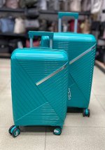 Чемодан дорожный из полипропилена зеленый средний