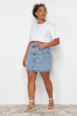 Голубая мини-джинсовая юбка с строчкой и кисточками