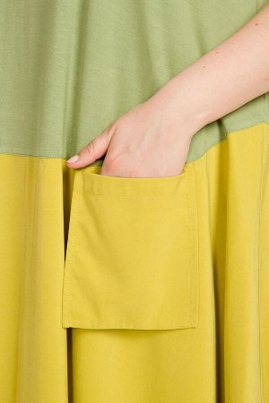 Платье Комфортное платье А-силуэта из двух видов ткани: верх -  вискозное полотно однотонной расцветки, низ  "поплин" . Круглый вырез горловины переда обработан широкой обтачкой и отстрочен двойной от