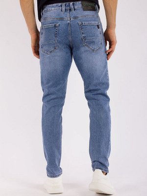 Джинсы Укороченные джинсы МОМ  с потертостями, изготовлены из мягкого, эластичного денима средней плотности. Модель с высокой посадкой, свободная в бедрах, штанины заужены книзу.
Цвет:&nbsp;
					
			