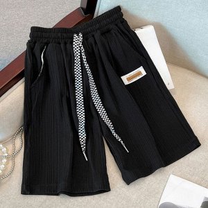 Фактурные шорты для девочки, свободного кроя, с эластичным поясом, черный