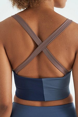 Женское бюстье из ткани для дайвинга с цветными блоками и крестиком на спине - 97260