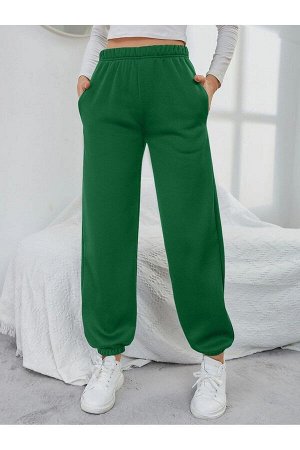 Женские зеленые эластичные спортивные штаны