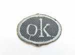 Лейбл клеевой &quot;OK&quot; овал 29х21 мм серый