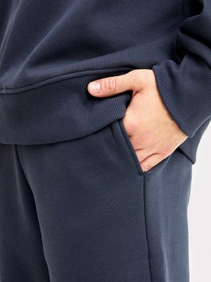 Комплект мужской (джемпер, брюки) в синем цвете
