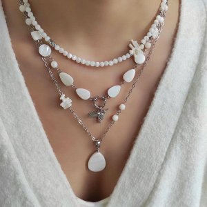 Сет из перламутра и коралла в белом металле