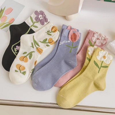 Уютные носочки и домашние тапочки для всей семьи
