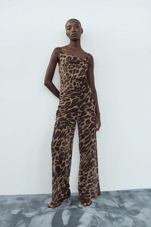 Топ Цвет как на первом фото ТОП В БЕЛЬЕВОМ ОБЛИКЕ С ЖИВОТНЫМ ПРИНТОМ (TOP IN LINGERIE-OPTIK MIT ANIMALPRINT) Слегка прозрачный топ, напоминающий нижнее белье. Струящийся вырез. Узкие регулируемые брет
