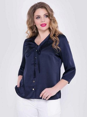 Блузка Стильная&nbsp;блуза прямого силуэта&nbsp;выполнена из струящегося атласа т.синего цвета.
- горловина оформлена V-образным вырезом с бантовыми завязками
- модель с укороченными втачными рукава