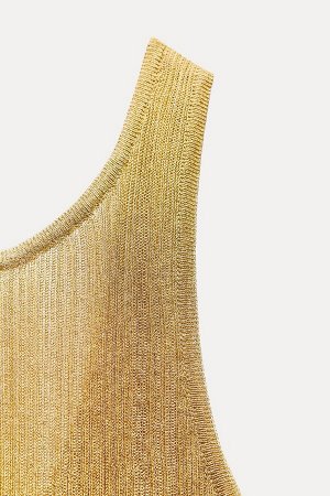 Топ Цвет как на первом фото ТРИКОТАЖНЫЙ ТОП НИТЬЯМИ ЛАМЭ (STRICKTOP MIT LAM?F?DEN) Топ без рукавов с круглым вырезом. Вырез на спине круглый. Детали резьбы Ламе. СОСТАВ МАТЕРИАЛА, ИНСТРУКЦИИ ПО УХОДУ 