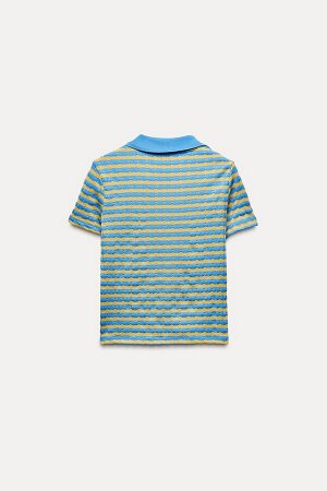 Топ Цвет как на первом фото ЖАККАРДОВАЯ РУБАШКА ПОЛО (JACQUARD-POLOSHIRT) Рубашка-поло с отложным воротником и V-образным вырезом. Короткие рукава. СОСТАВ МАТЕРИАЛА, ИНСТРУКЦИИ ПО УХОДУ И ПРОИСХОЖДЕНИ