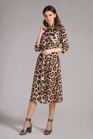 Платье Платье Magia mody 1549 леопард 
Состав ткани: Вискоза-27%; ПЭ-70%; Эластан-3%; 
Рост: 164 см.

Стильное платье из плательной ткани, отрезное по линии талии, присборено на резинку, в верхней ча