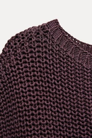 Топ Цвет как на первом фото ГРУБЫЙ ТРИКОТАЖНЫЙ ЖИЛЕТ (GROB GESTRICKTE WESTE) Свитер крупной вязки, без рукавов, с широким круглым вырезом и узким подолом. СОСТАВ МАТЕРИАЛА, ИНСТРУКЦИИ ПО УХОДУ И ПРОИС