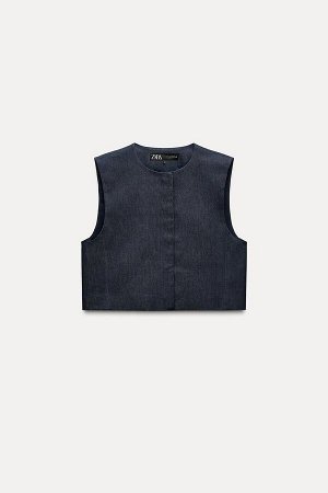 Топ Цвет как на первом фото ДЖИНСОВЫЙ ЖИЛЕТ (JEANS-WESTE) Жилет с круглым вырезом и без рукавов. Потайная планка на кнопках спереди. СОСТАВ МАТЕРИАЛА, ИНСТРУКЦИИ ПО УХОДУ И ПРОИСХОЖДЕНИЕ СОСТАВ МАТЕРИ