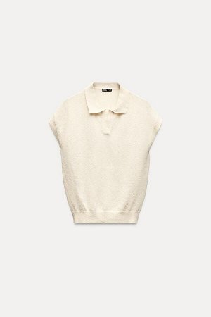 Топ Цвет как на первом фото КОРОТКИЙ ТРИКОТАЖНЫЙ ТОП (KURZES STRICKOBERTEIL) Жилет из трикотажного полотна. Воротник-поло и V-образный вырез, без рукавов. СОСТАВ МАТЕРИАЛА, ИНСТРУКЦИИ ПО УХОДУ И ПРОИС
