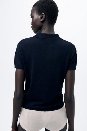 Топ Цвет как на первом фото БАЗОВАЯ РУБАШКА ПОЛО ТОНКОГО ТРИКОТАЖА (BASIC-POLOSHIRT MIT FEINSTRICK) Топ в стиле поло с воротником с лацканами и короткими рукавами. Пуговицы спереди. С ребристыми конца