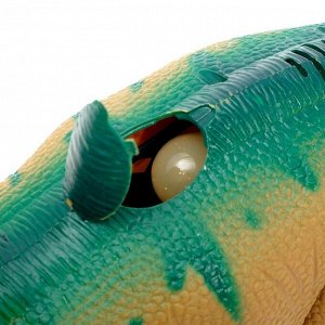 Динозавр "Трицератопс", работает от батареек, откладывает яйца, световые и звуковые эффекты